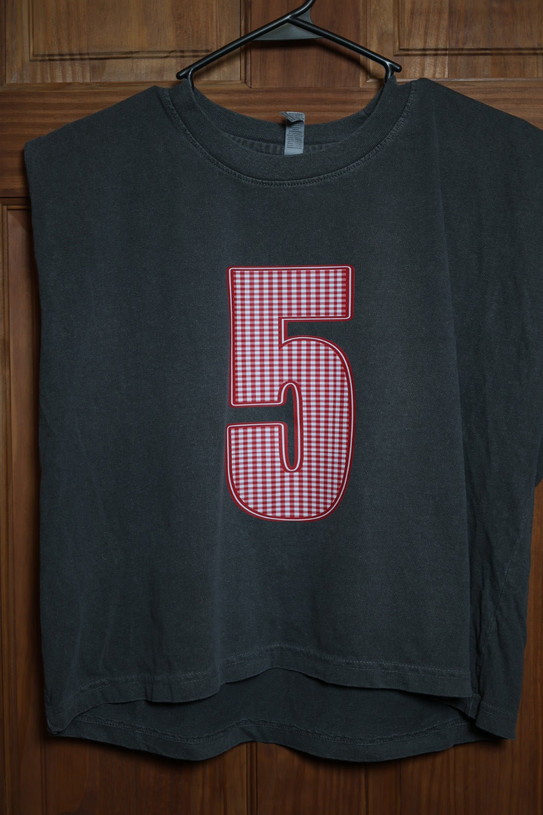 Charcoal gray muscle tank featuring a custom red and white gingham varsity number 5 centered on the front.