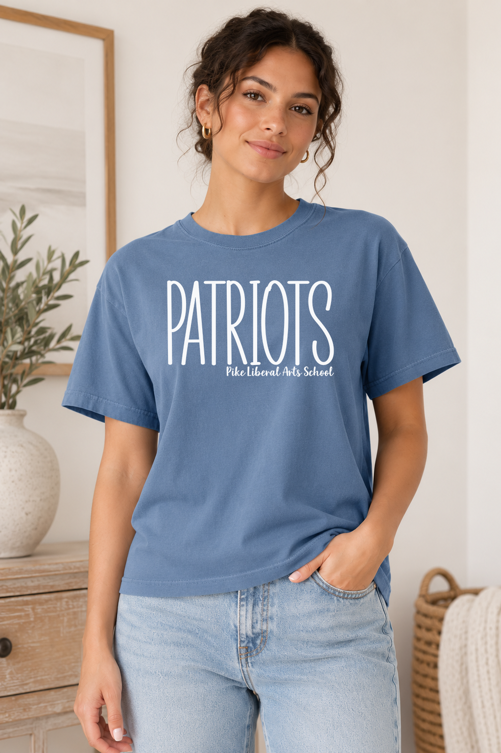 Boutique-style custom mascot spirit t-shirt featuring a personalized school mascot design on a premium unisex tee. Available in multiple school and shirt color options for students, parents, teachers, alumni, and game day.